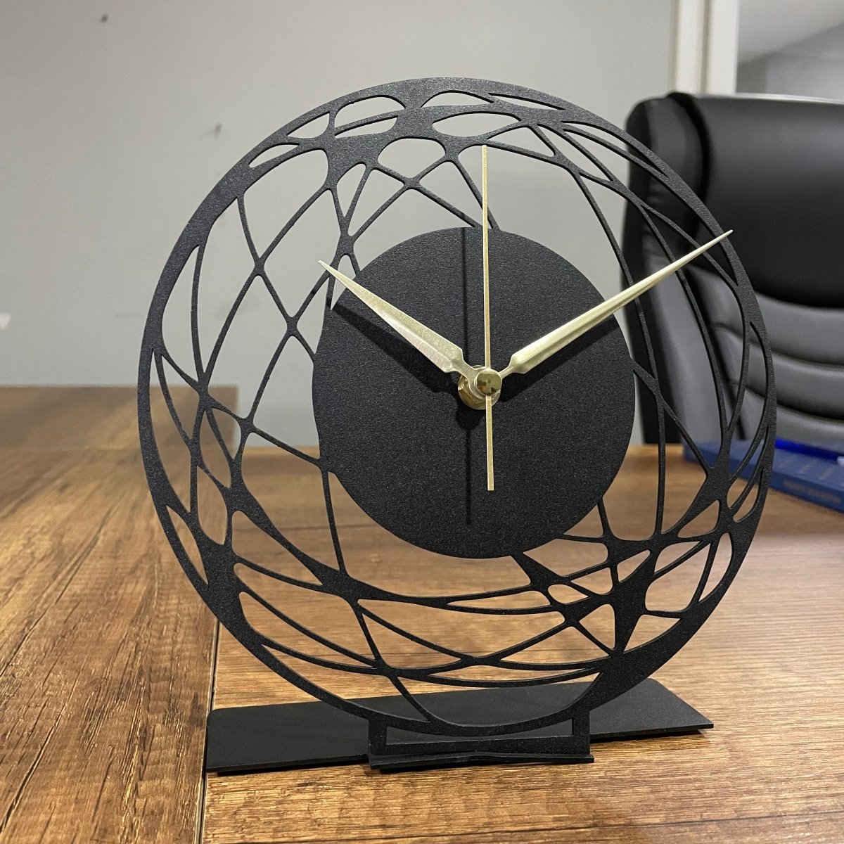 Abstract Artistic Tabletop Clock With Intricate Design - Image 3